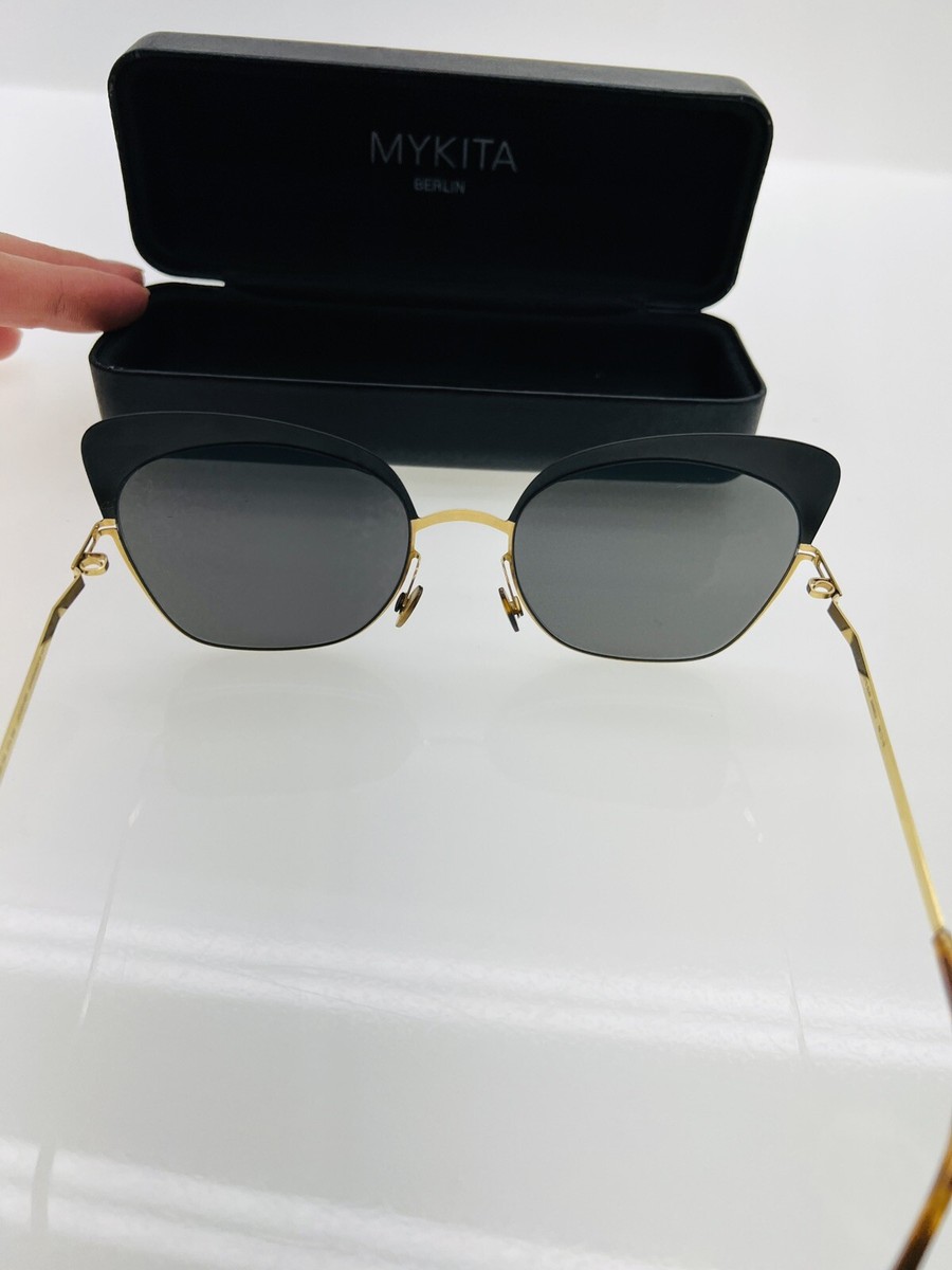 Mykita ANNELI Shiny Gold Matte Black/Brillant Grey 21/21/0 unisex Sunglasses. Mykita ANNELI Shiny Gold Matte Black/Brillant Grey 21/21/0  main image 2