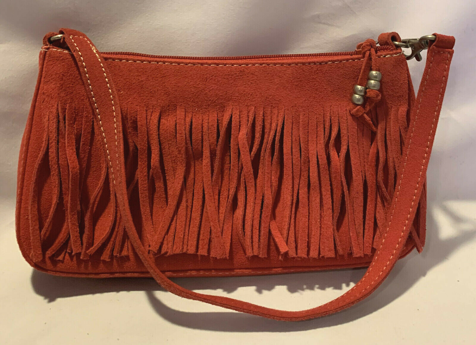 red fringe purse