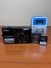 Nikon Coolpix S570 12MP Digital Camera with SD Charger Battery