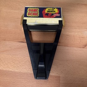 Nintendo NES Game Genie with Original Booklet Missing Back Cover