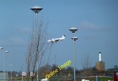 Photo 6x4 Plane landing Rochford/TQ8790 At London Southend Airport. Take c2012
