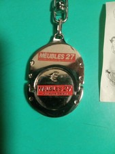 Jeton Caddie Publicitaire . Meubles 27 . Guillaume Gérard. Publicité Jeton Caddy