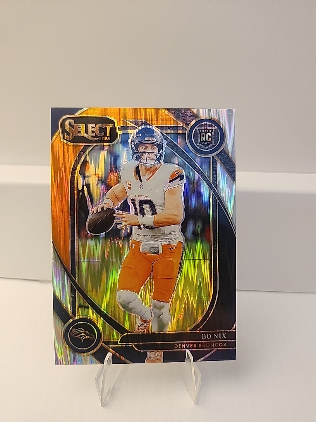 2024 Panini Select - Club Level Bo Nix #221 Black & Orange Shock Prizm (RC)