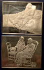 Two Franklin mint sterling silver Norman Rockwell ingots over six troy ounces