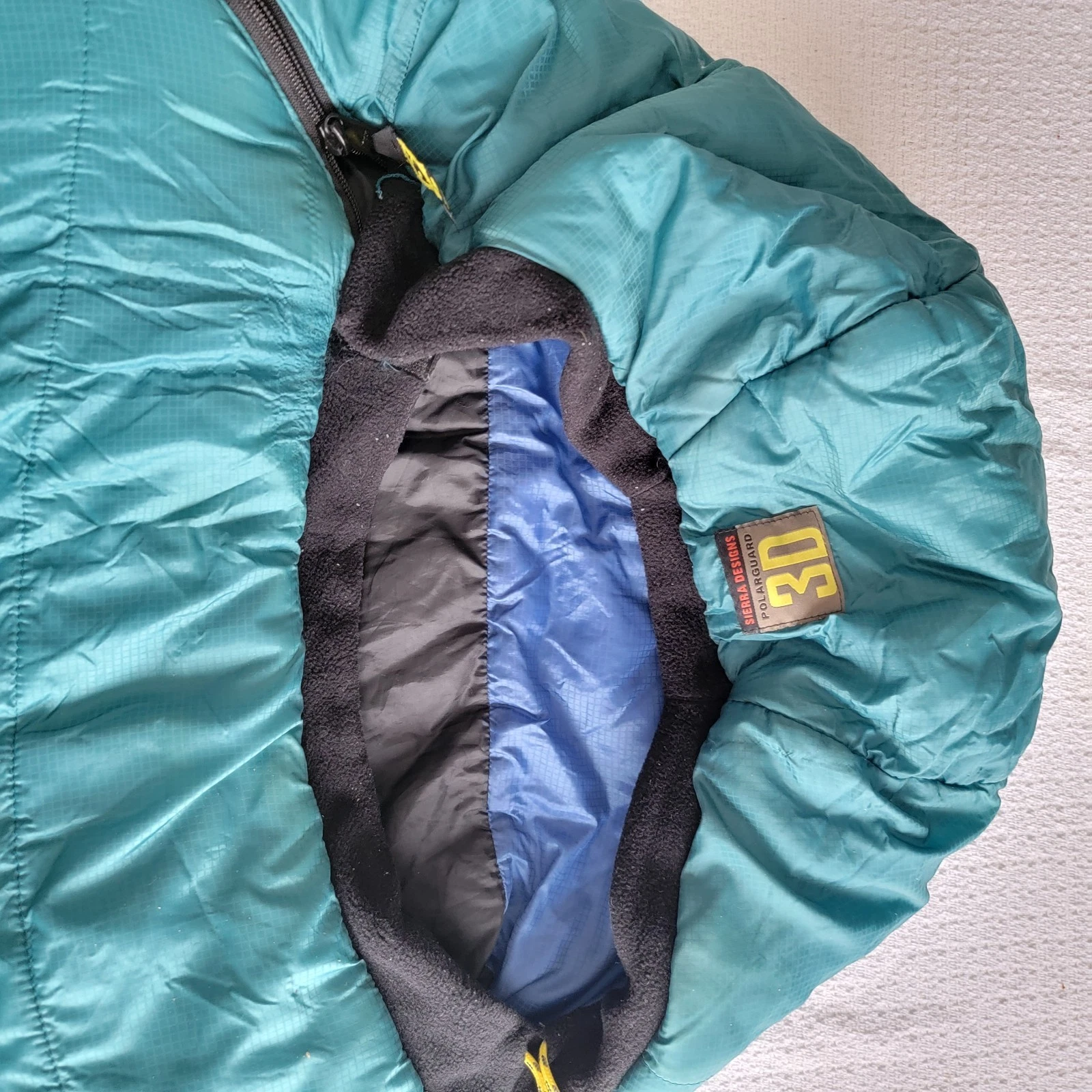 Sierra Designs 3 season sleeping bag Polar guard 300 insulation Zippers work