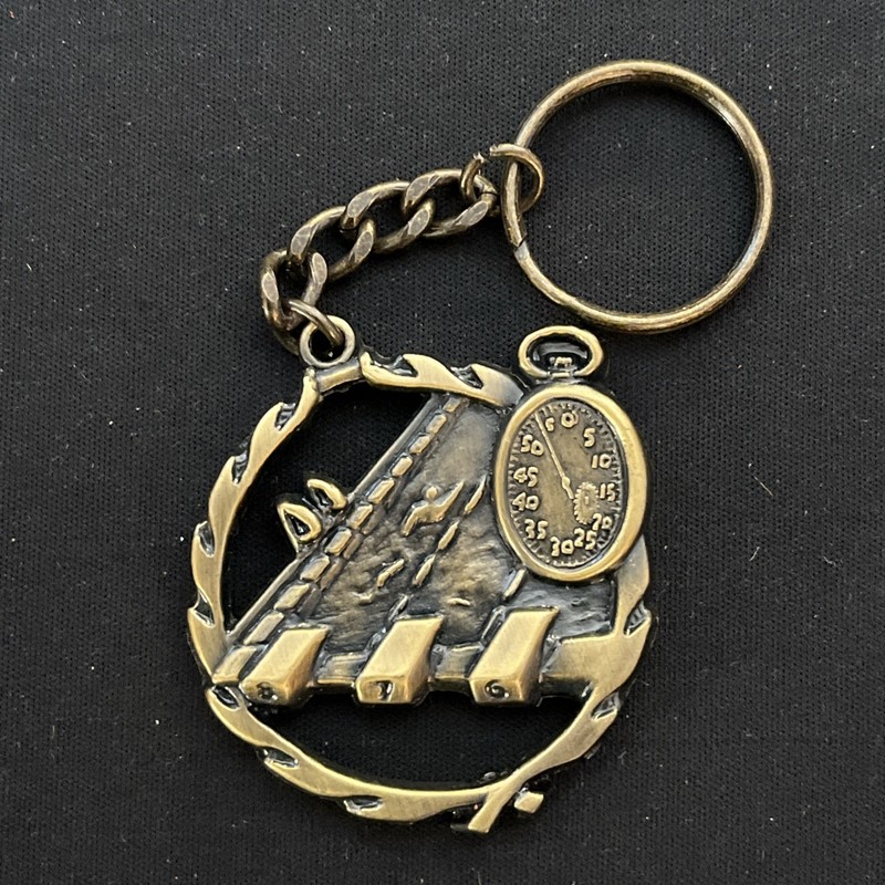 1.75" Swimming gold medal, with keychain attached