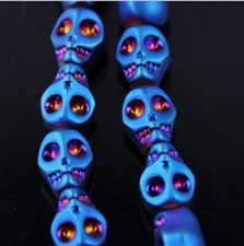 100pcs Crystal Glass Carved blue Skull Pressed Loose Beads 8x10mm