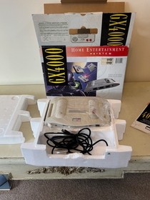 Amstrad GX 4000 Console with Controllers & Burnin' Rubber Game