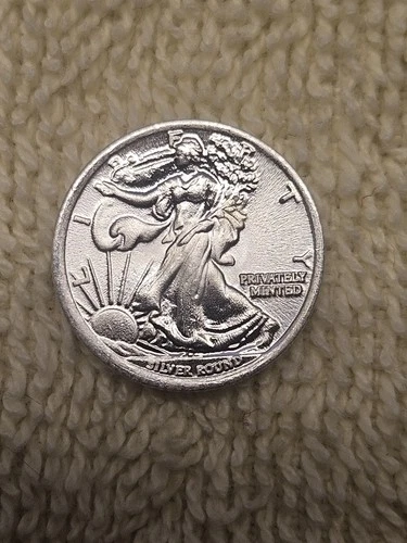(1) 1/10 oz Silver Round!  Walking Liberty And Eagle Design!