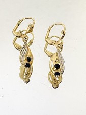 Boucles d’oreilles dormeuses en plaqué or ornées de pierres bleues