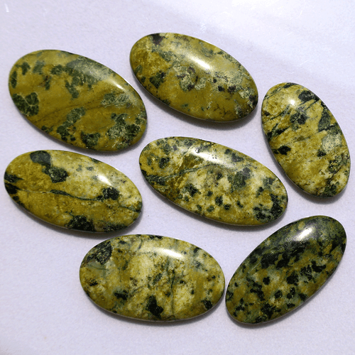 Venta al por mayor Lote de 7 piedras preciosas cabujón ovalado serpentina natural sin tratar 36-44 mm - Imagen 4 de 11