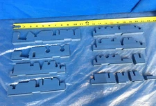 Twelve blue silicone sterilization tray instrument plug-in inserts