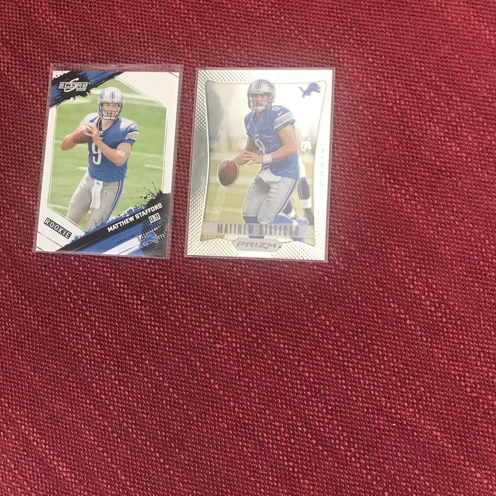 2 Matthew Stafford Rookie Cards: 2009 Score #377- 2012 First Prizm Card #67