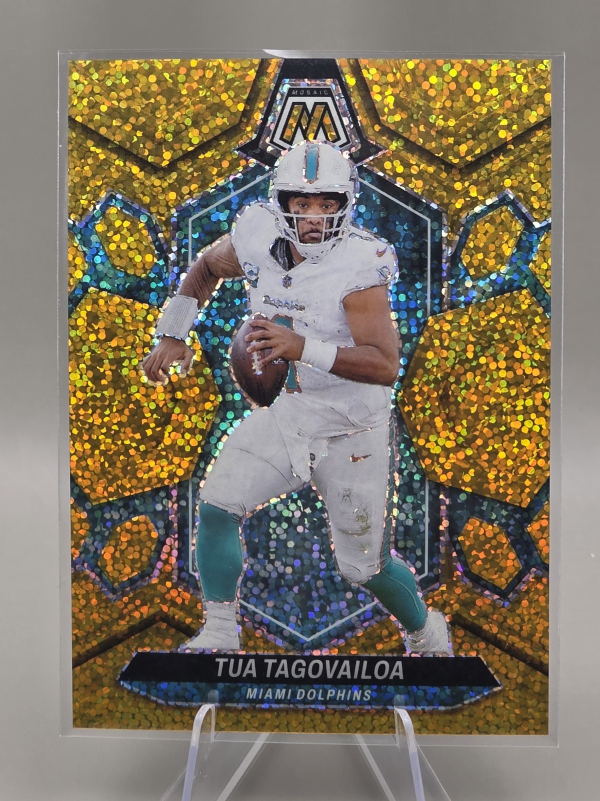 2024 Panini Mosaic Sparkle Football Tua Tagovailoa #134 Gold Sparkle #/24