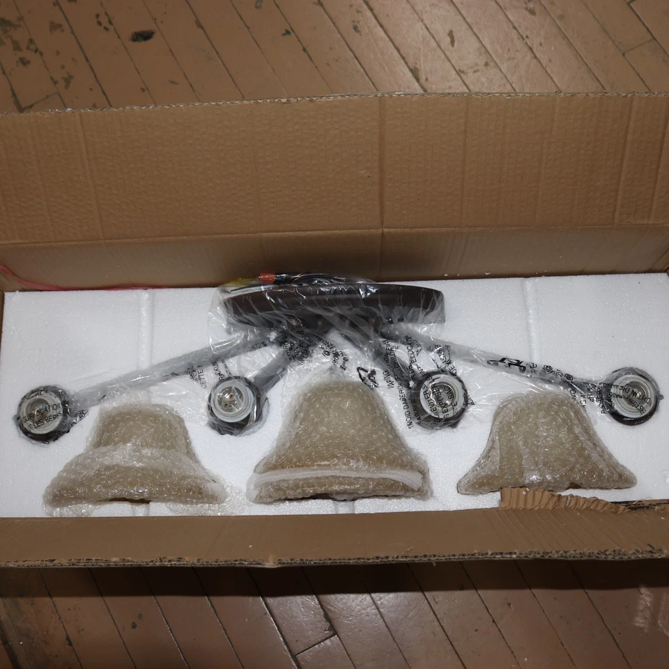 Luz de tocador de baño Golden Lighting Lancaster Collection 4 luces bronce frotado Foto 4 de 4