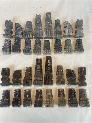 32 Pieces Small Carved Gray Brown Stone Chess Pieces No Board good condition.