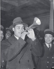 Joe Louis Brown Bomber of fight ring has a new hobby playing bazoo- Old Photo