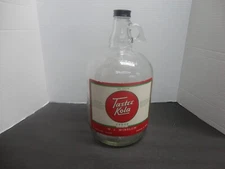 TASTEE KOLA SODA FOUNTAIN SYRUP JUG ADVERTISING BOSTON, MASS.