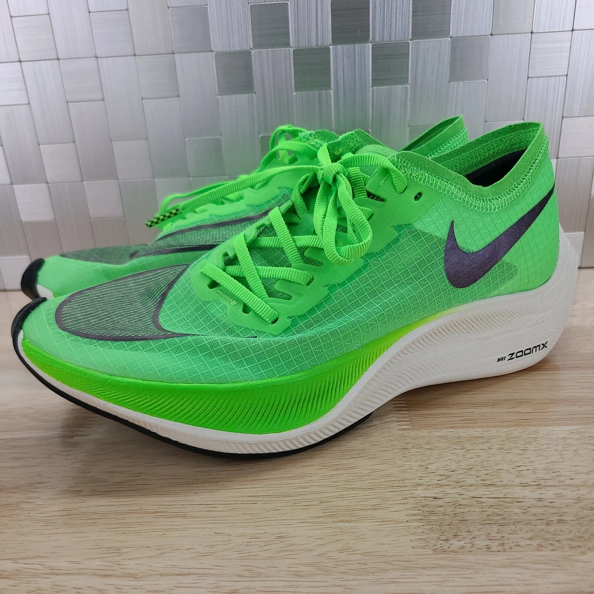 Nike zoomx vaporfly next green sales