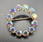 Vintage Iridescent AB Rhinestone Circle Wreath Pin Mid-Century Costume Jewelry