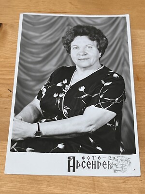 1970s Woman with a watch Woman in dress Soviet people Vintage photo
