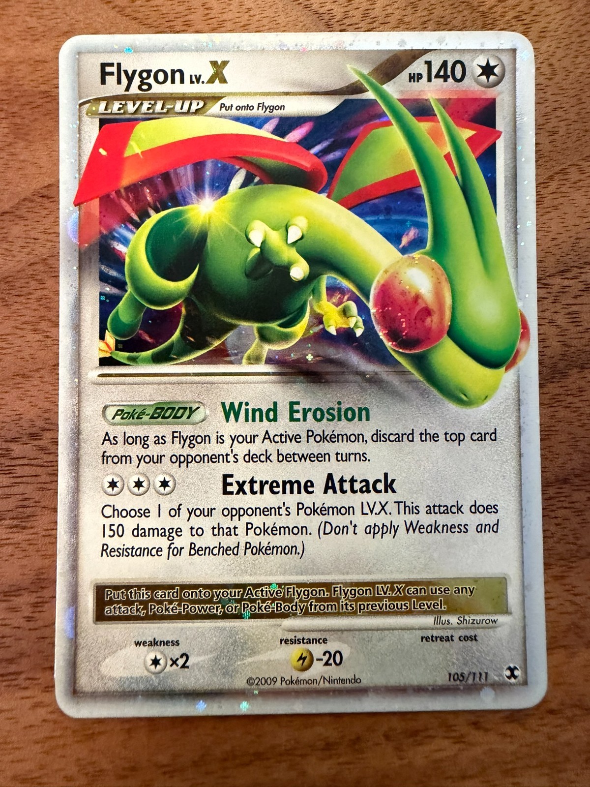 Flygon Lv.X 105/111 Rising Rivals Holo LP