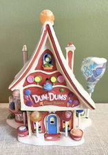 Dept 56 North Pole Series Dum-Dums Flavor Makers Porcelain Building 6014521