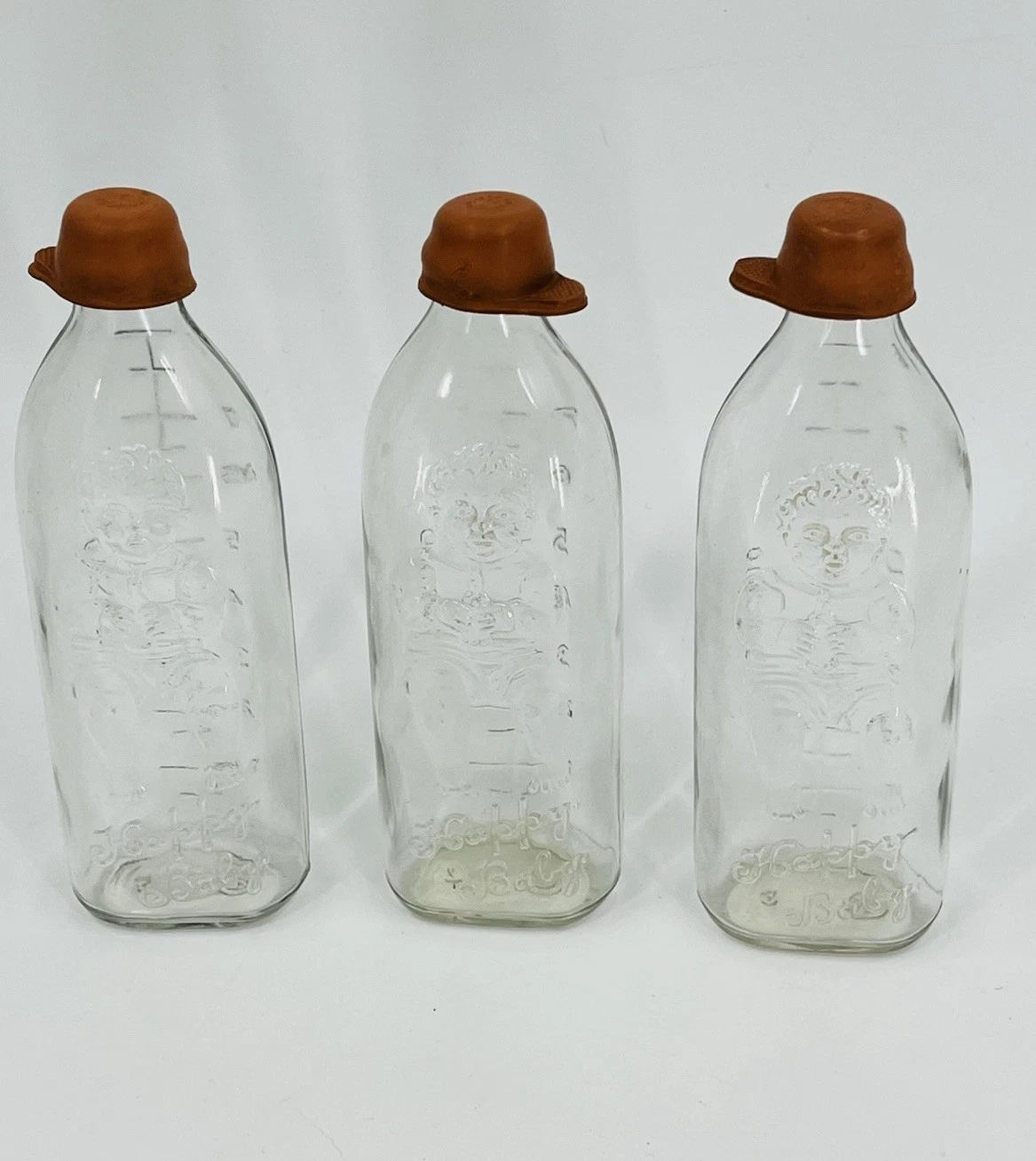 Vintage Glass Happy Baby Bottles Set of 3 Rubber Tops 8 Ounce Embossed