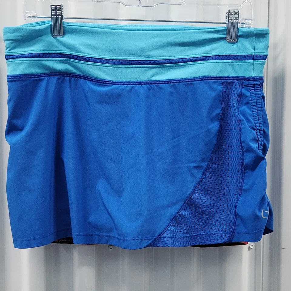 Pantalones cortos deportivos Moving Comfort para mujer talla mediana azules elásticos Foto 2 de 4