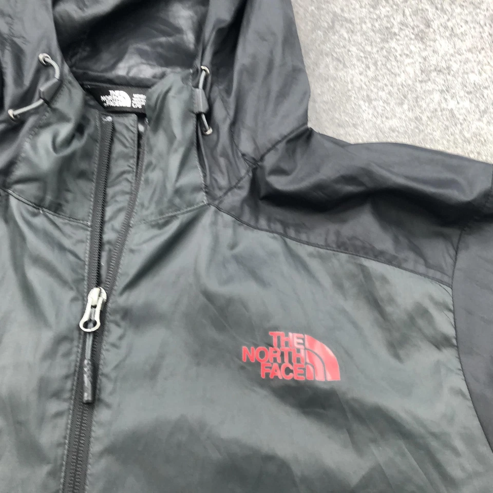 Chaqueta cortavientos The North Face para hombre grande negra cortavientos con capucha cremallera Foto 4 de 4