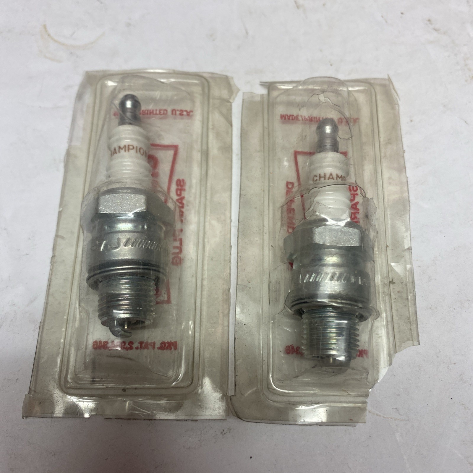 2 NOS Champion L-7J Spark Plugs for Outboards Lot Of 2