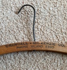 Crandall, Mckenzie Company Wooden Hanger