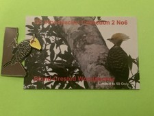 None RSPB badge. BLOND CRESTED WOODPECKER with  backing card