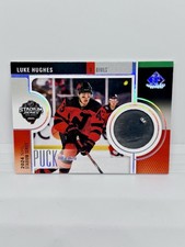 LUKE HUGHES 2024-25 SP Game Used Stadium Series Puck Relic New Jersey Devils