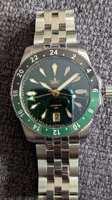 Phoibos Voyager GMT PY058A Full set Green Aventurine Dial 100mt. Ceramic bezel