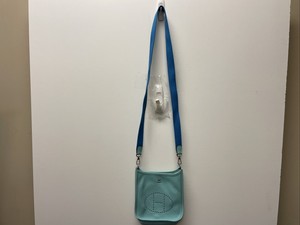 light blue messenger bag