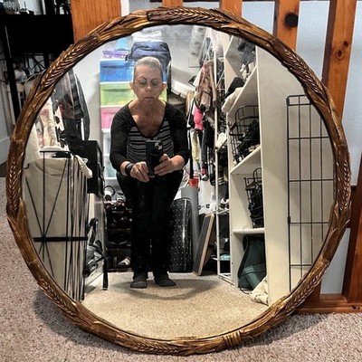 Friedman Brothers Decorative Arts Inc Round mirror with a carved bark-like frame