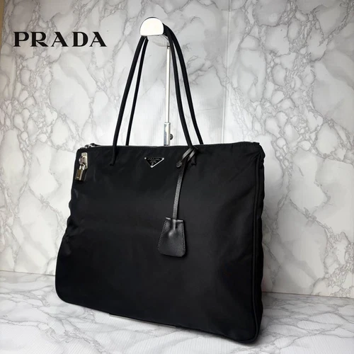 PRADA 061 Extreme Beauty PRADA Sac fourre tout cadenas à bandoulière avec clé noir md9