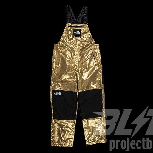 Pantalon bavoir montagne métallisé doré SS18 Supreme The North Face taille L Large 2018
