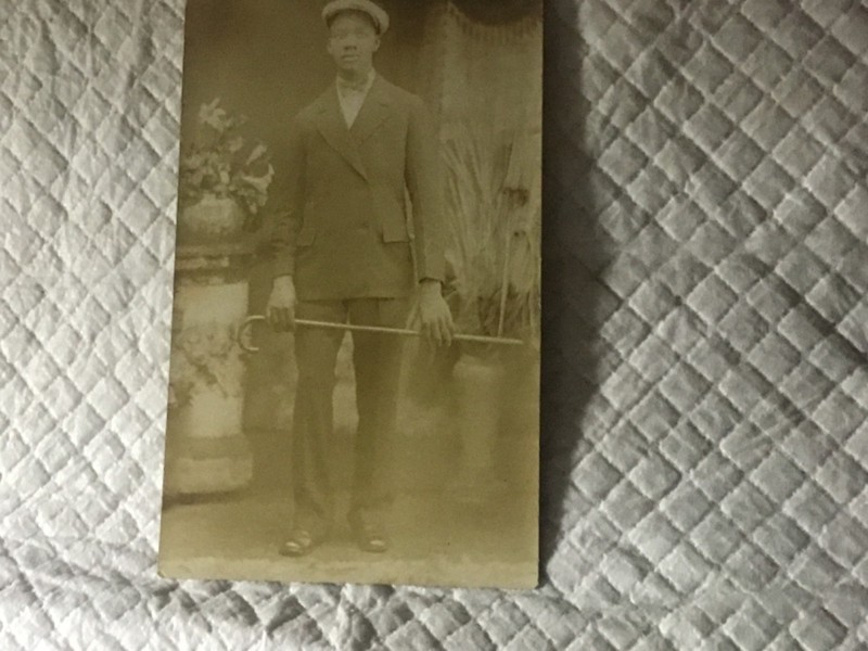 African American Well dressed Man with Cane (photo postcard)