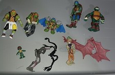 lot of 8 figures + Parts Nickelodeon 2012 Tee...