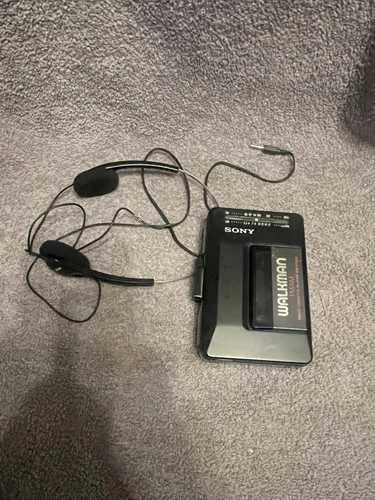 Vintage Sony Walkman WM-f2015 Cassette Radio Player  And Head Phones