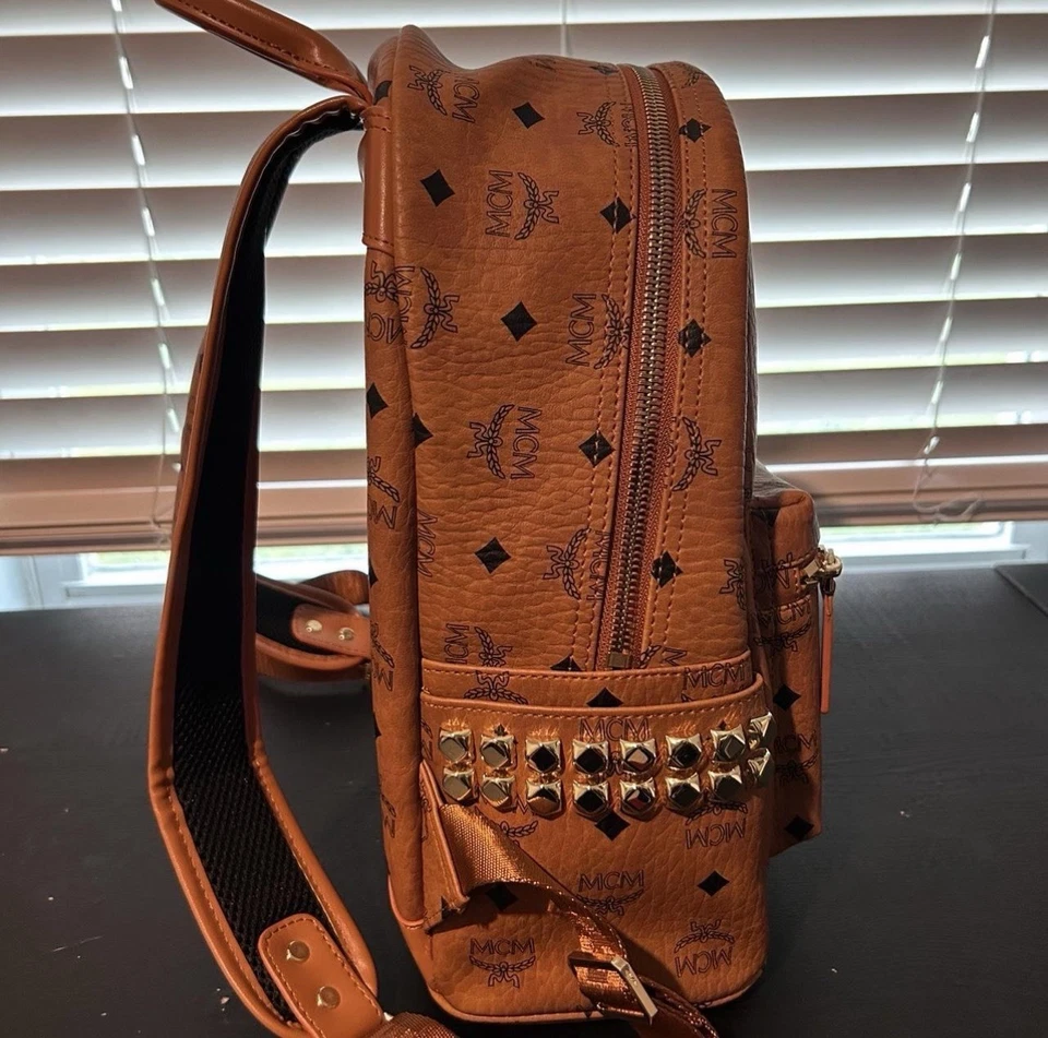 Mochila MCM de cuero negro/marrón talla mediana  Foto 3 de 4