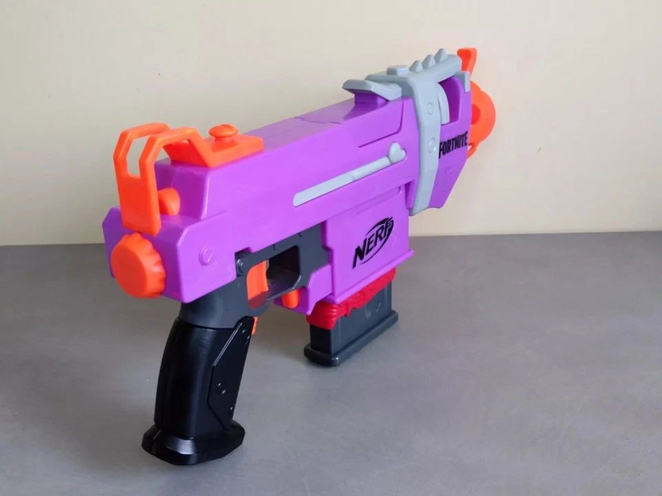 NERF Fortnite SMG-E Pistolet Automatique Violet Mauve Chargeur 6 + 10 Fléchettes - Photo 4/4