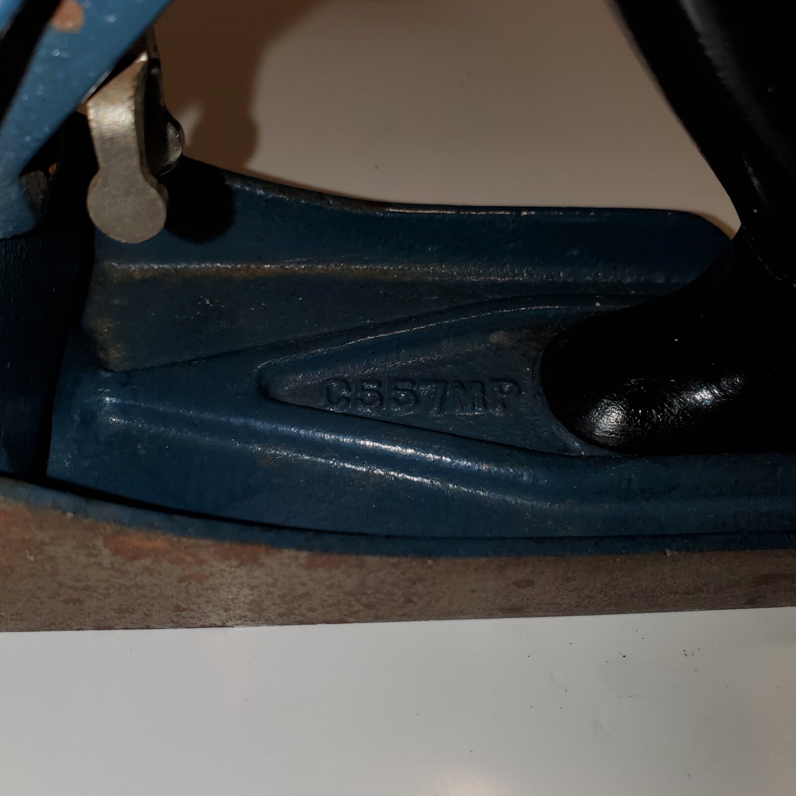 Vintage blackhawk C557MP wood hand plane with visible metal markings and engraved oval shape on smooth bottom.