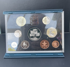 1996 QEII Royal Mint Proof Coin set incl. w.Cup £2 + QEII 70th £5 BUNC in folder