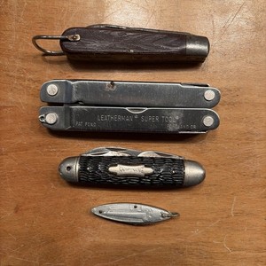 leatherman multi tool & 3 Pocket Knives