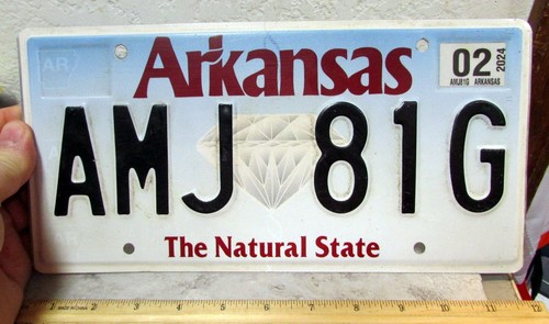 Arkansas metal License Plate, AMJ 81G exp 2002, The Natural State, Diamond Logo