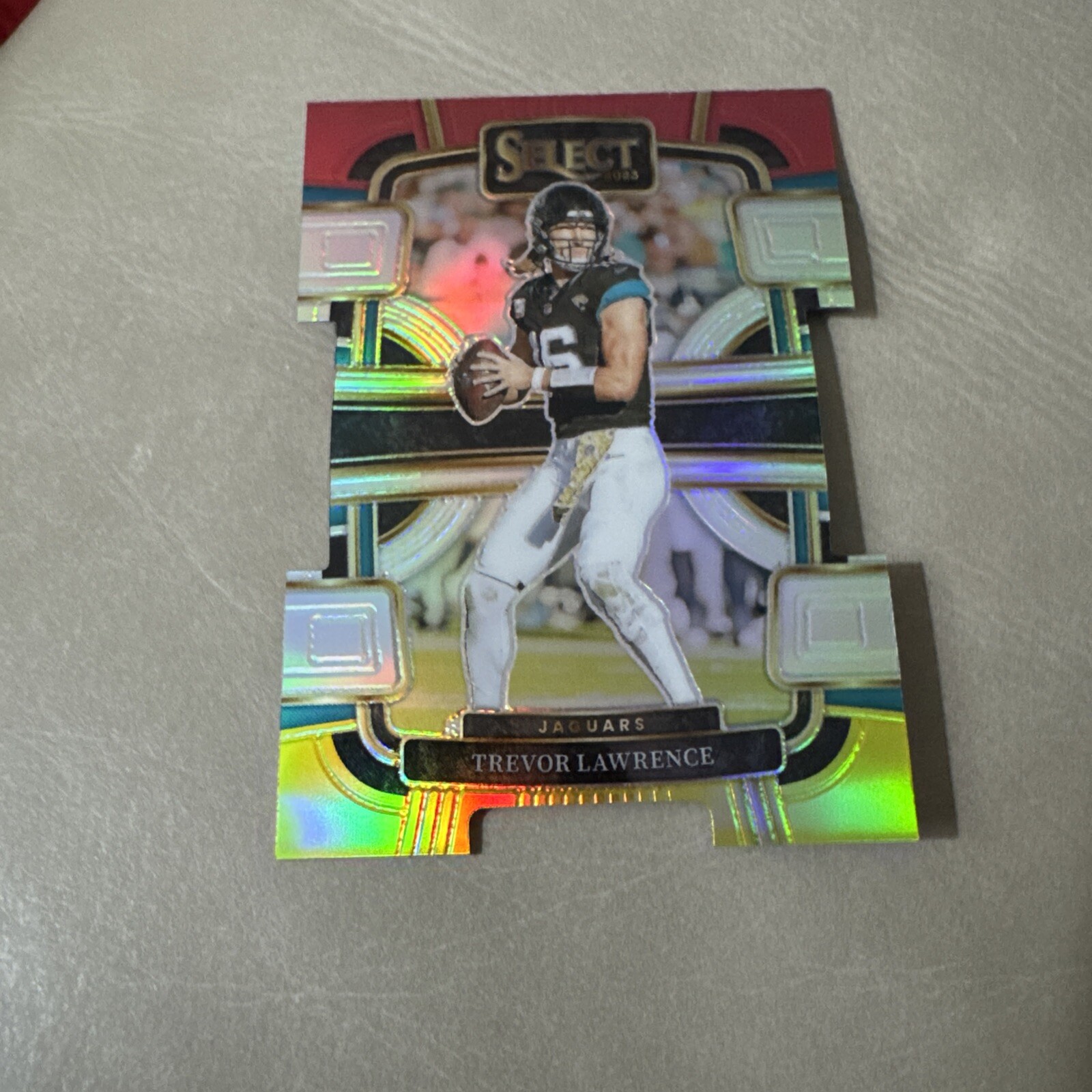 2023 Select - Trevor Lawrence - RED & YELLOW DIE-CUT - Jaguars - #46