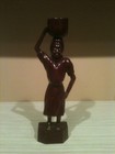 African Art -Female carrying an item — photo 1